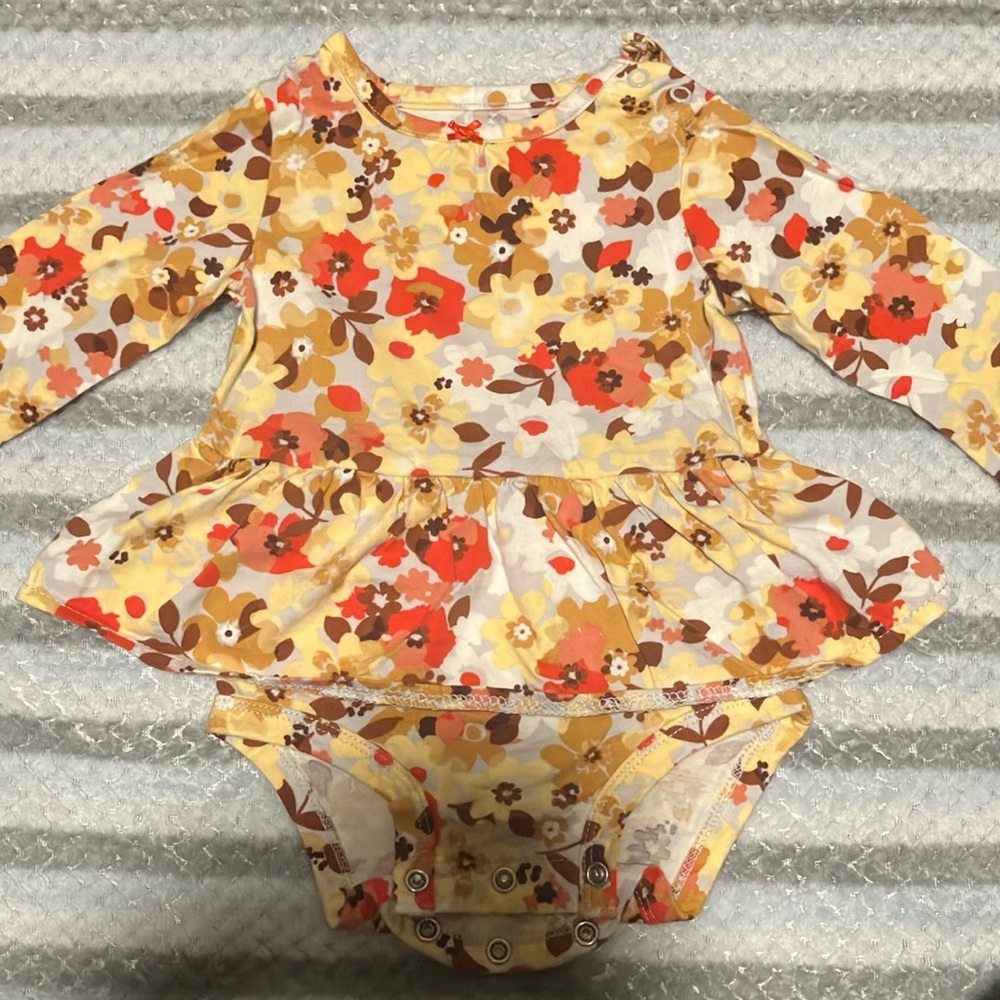 Girls bodysuit 12 months, very cute.